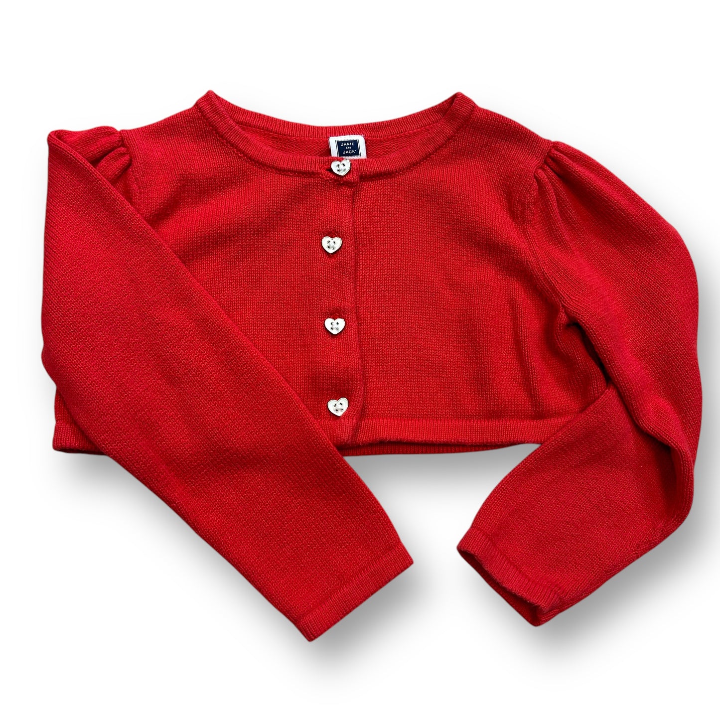 A bright red cardigan with heart-shaped buttons and a round neckline, designed for girls in a 2T size.