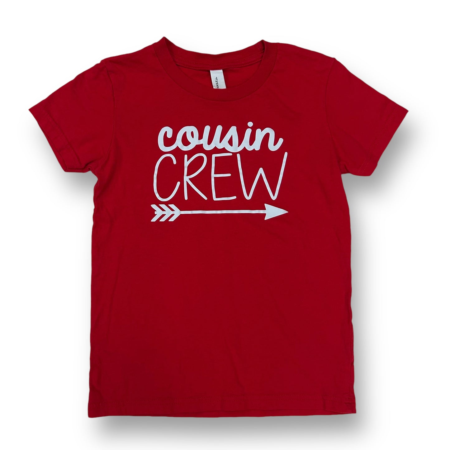 A red short sleeve shirt for boys with the text 'COUSIN CREW' printed in white on the front.