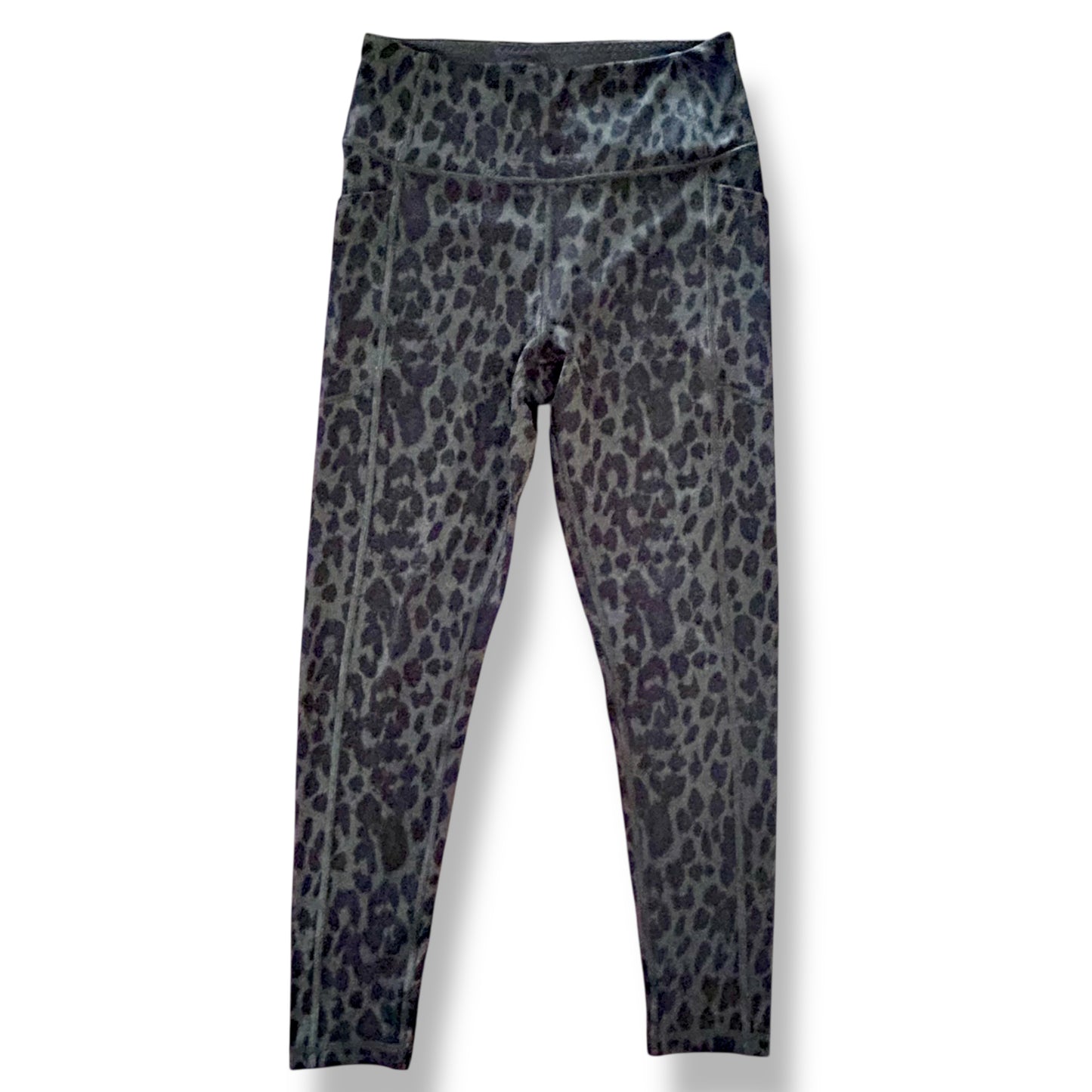 Leopard print leggings on a white background
