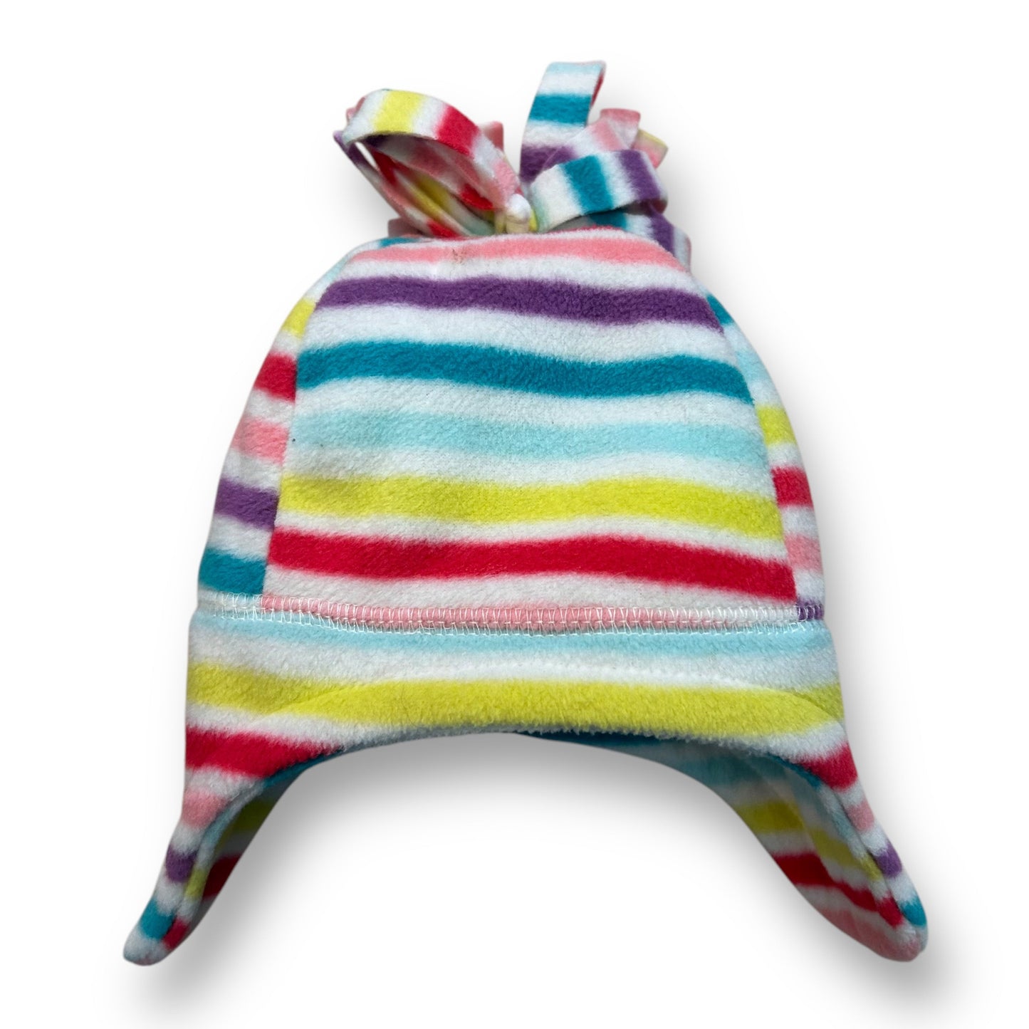 A multicolored striped pom beanie winter hat for girls, with a striped pattern and a bow on top.