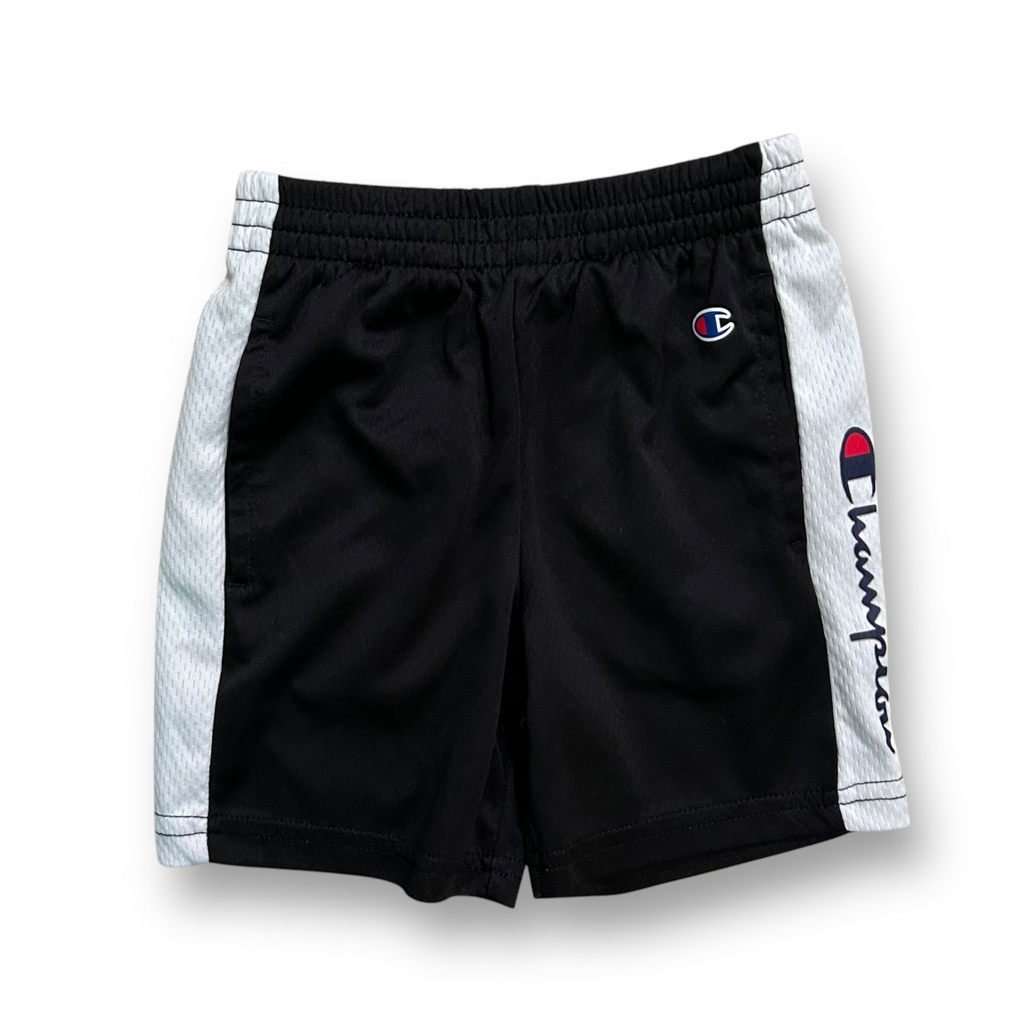 A pair of boys' athletic shorts with black color and a white brand logo on the left thigh.