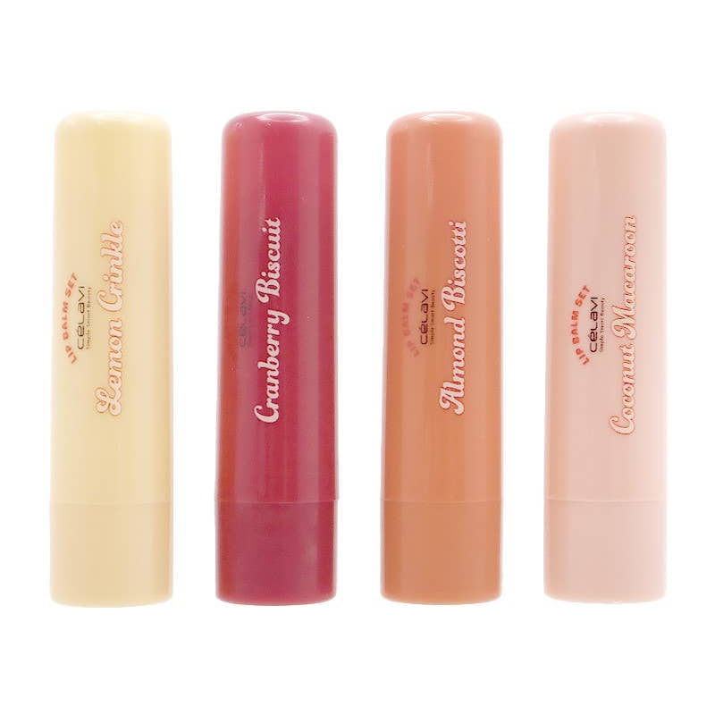 Four lip balms with different shades on a white background