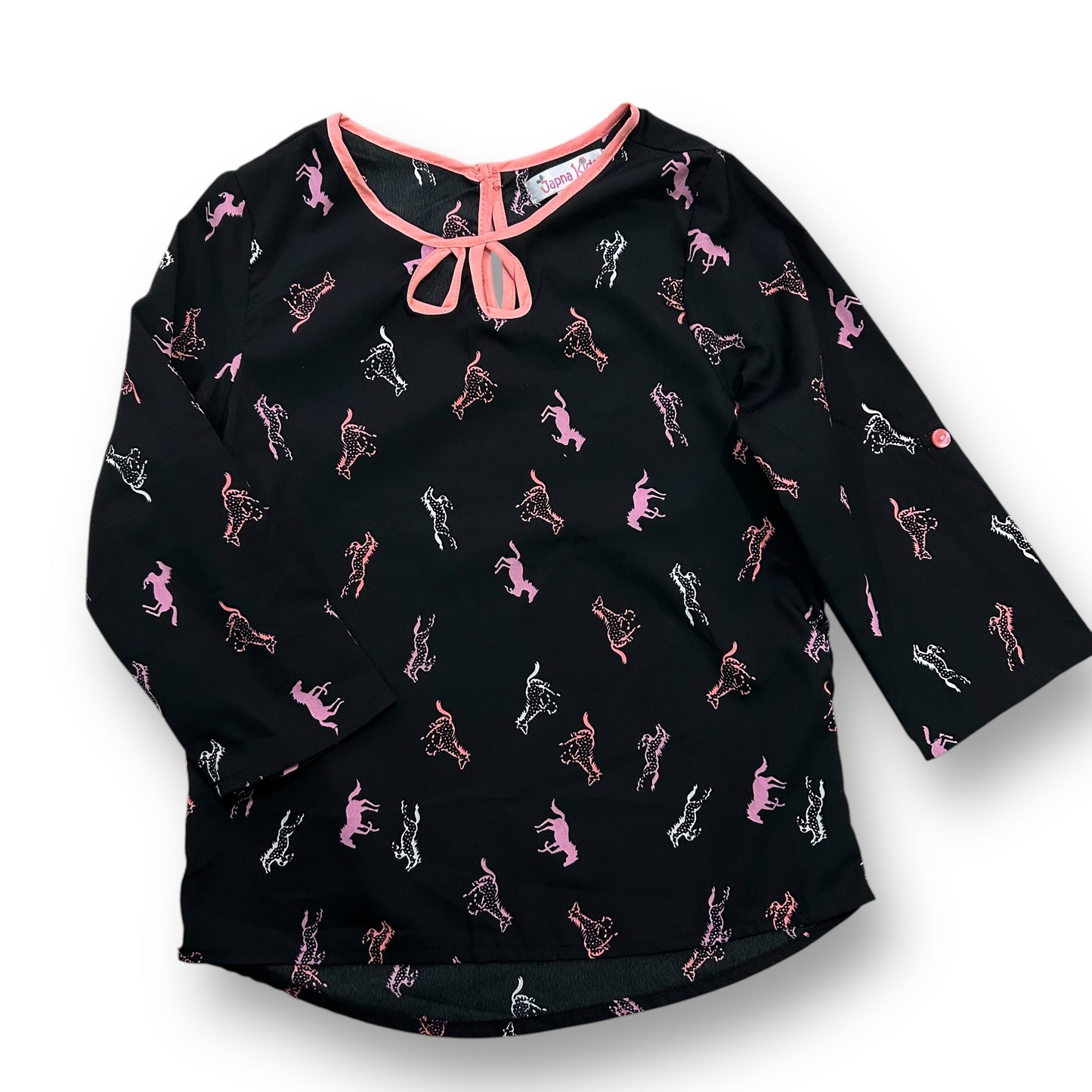 A black blouse with horse print, featuring 3/4 sleeves and a bow neckline.