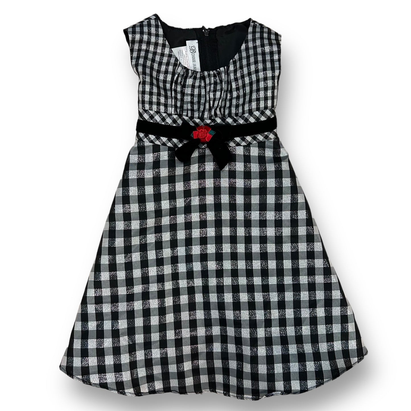 Girls' Bonnie Jean checkered holiday dress in black and white with a shimmering pattern and a red belt buckle.
