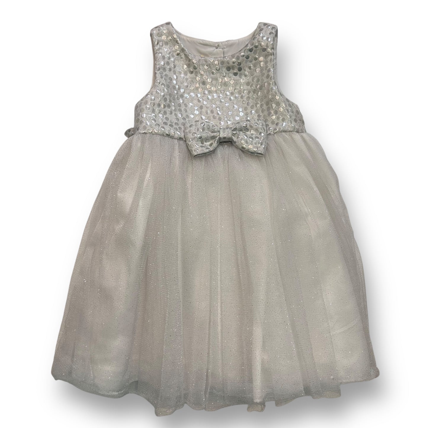 A size 2 girls' holiday dress with a shimmery tulle fabric and a bow embellishment on the neckline.