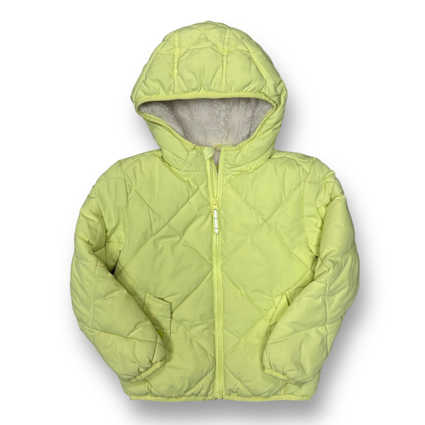 Bright green girls' winter coat with a sherpa hood, featuring a front zipper and a visible brand logo on the lower left side.