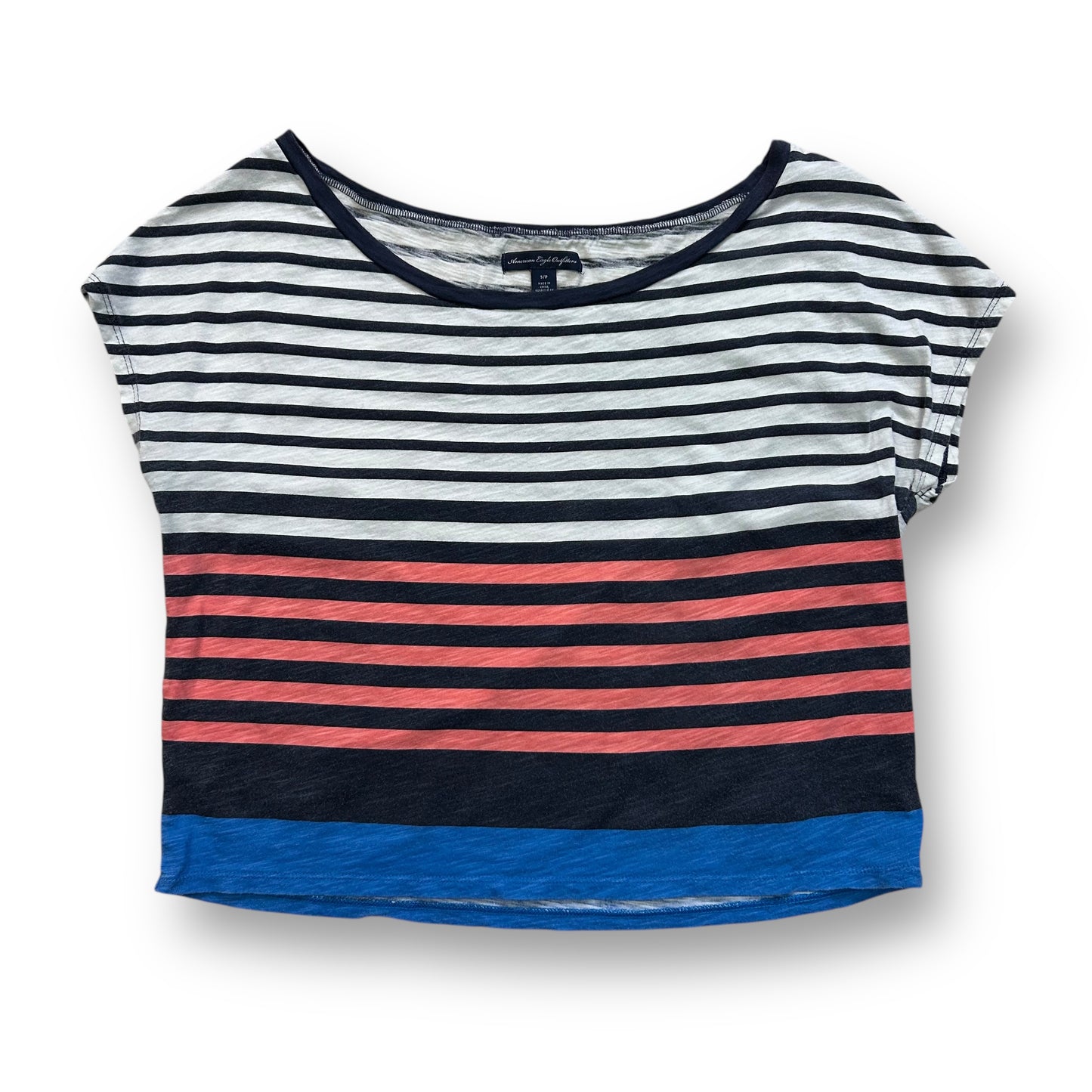 A loose fit, short sleeve top featuring horizontal stripes in varying shades of black, white, red, and blue.