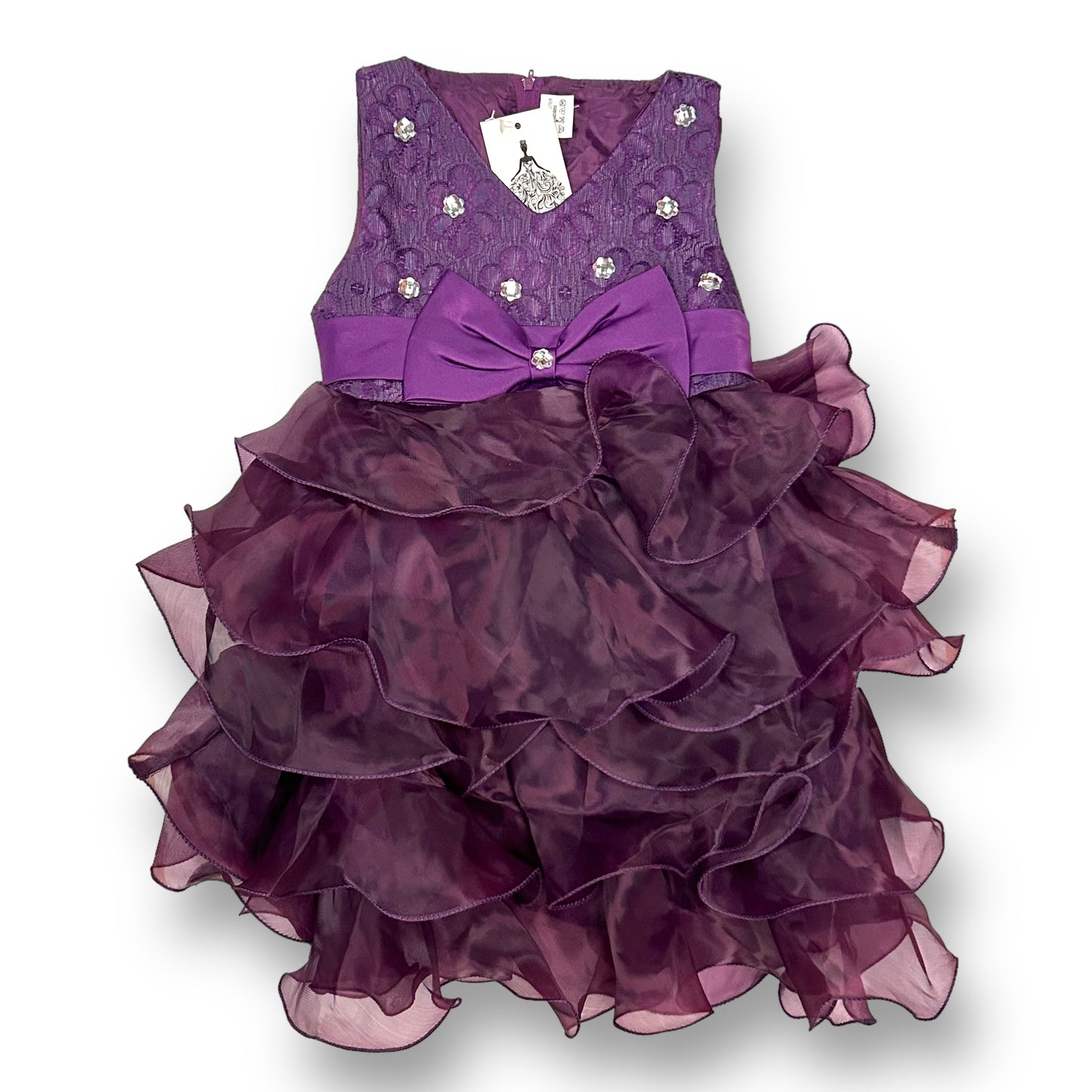 Girls size 3/4 purple silky ruffle fancy dress with a bow detail in the center.