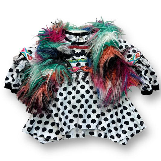 A multicolored furry sweater and tassel top for girls, with long sleeves and a variety of colors including green, pink, and yellow.