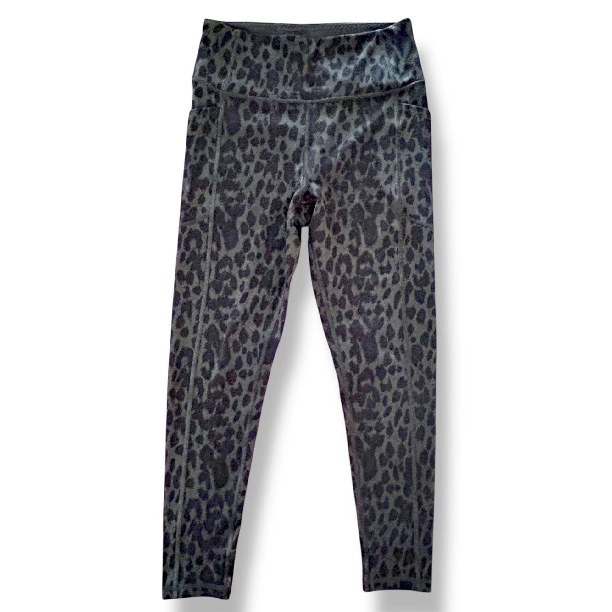 Leopard print leggings on a white background