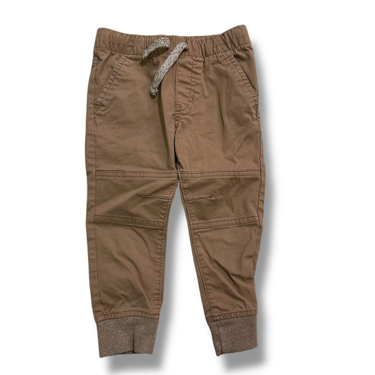 Boys' brown khaki elastic waist joggers with pockets and drawstring.