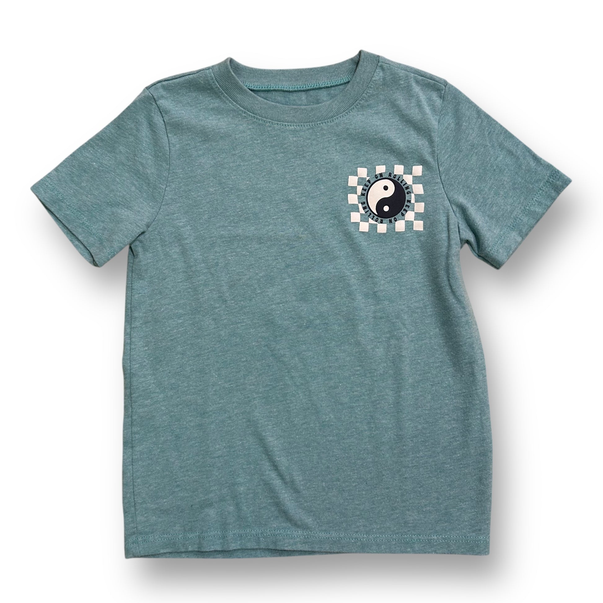 Aqua blue short-sleeved t-shirt with a black checkered pattern on the front and a black yin-yang symbol.