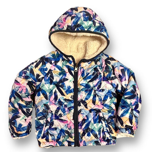 A girls' winter coat with a blue floral print and a hood, lined with sherpa fabric.