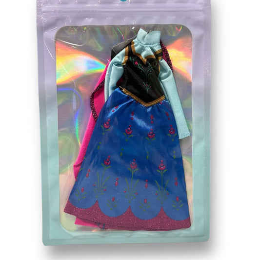 Disney Frozen Princess Anna Barbie Doll Dress in packaging, featuring the character's iconic blue and pink outfit.
