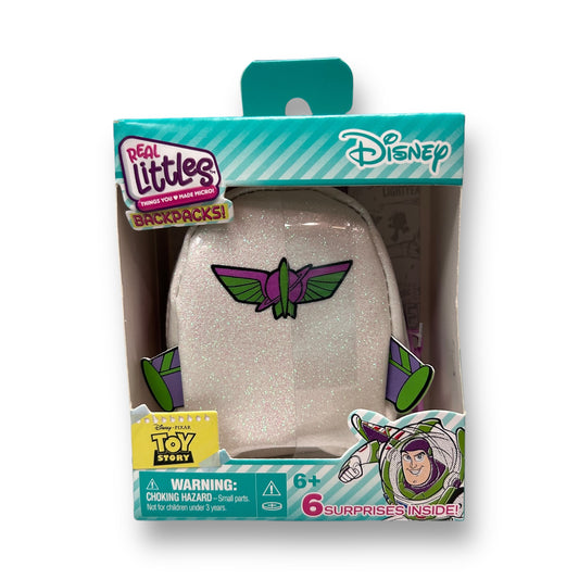 Disney Real Littles Backpacks! Pixar Toy Story Buzz Lightyear edition, packaged in a blister pack with graphics and character names displayed on the front.