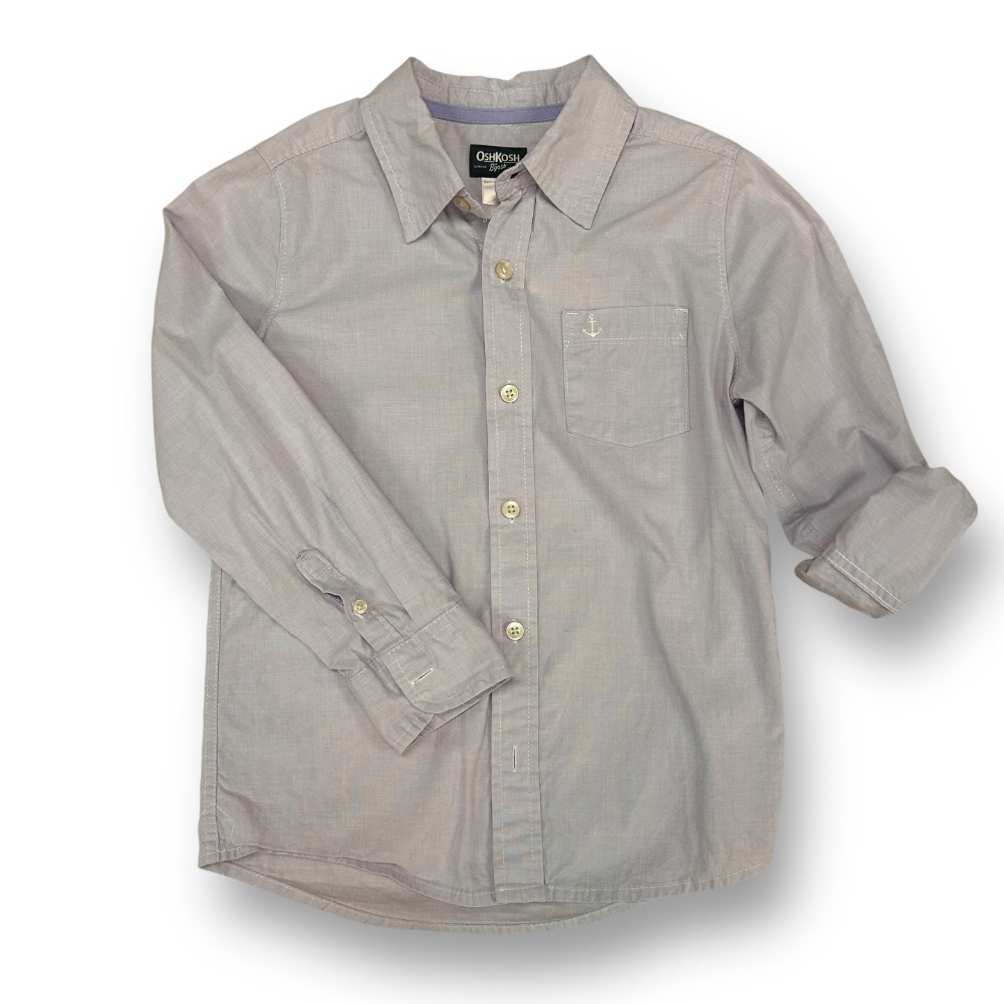 A light purple, long-sleeved, button-down dress shirt for boys.
