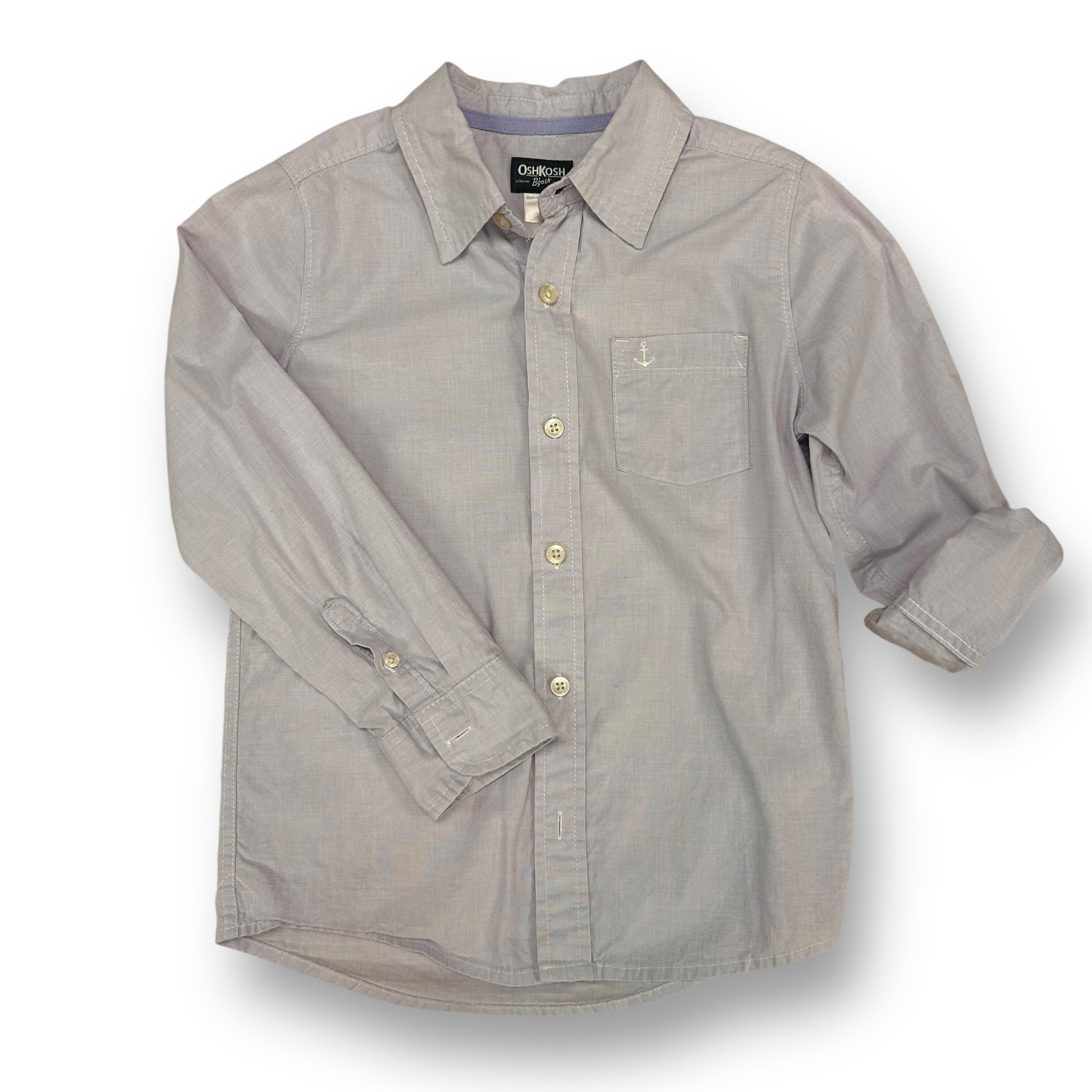A light purple, long-sleeved, button-down dress shirt for boys.