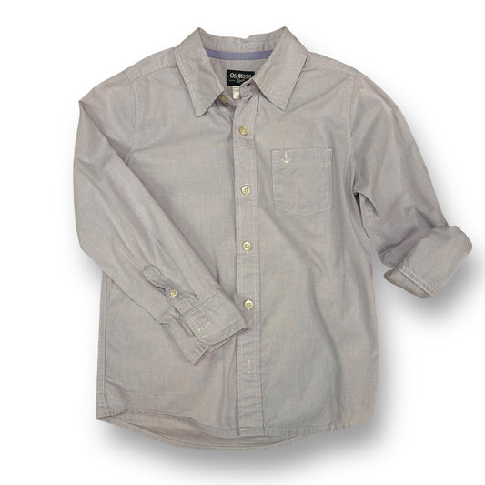 A light purple, long-sleeved, button-down dress shirt for boys.
