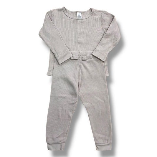A grey long-sleeved thermal top and matching joggers pants for boys, laid flat on a white background.
