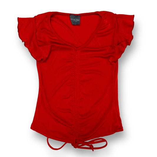 A red spandex cinched blouse with short sleeves, designed for girls sized XS.