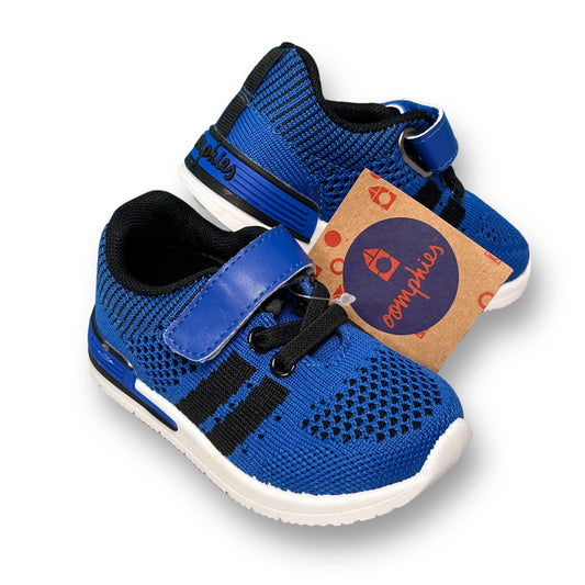 A pair of royal blue toddler boy size 5 no-tie sneakers with a label attached to the upper right corner.