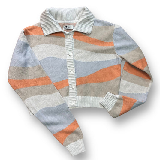 A Hollister junior girls' size XS cropped cardigan sweater with long sleeves and multicolored stripes.
