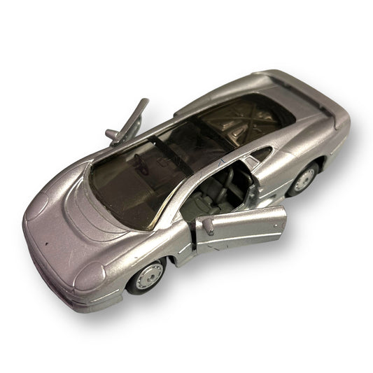A silver Maisto Jaguar XJ220 scale 1/40 collector's diecast pull-back friction toy car.