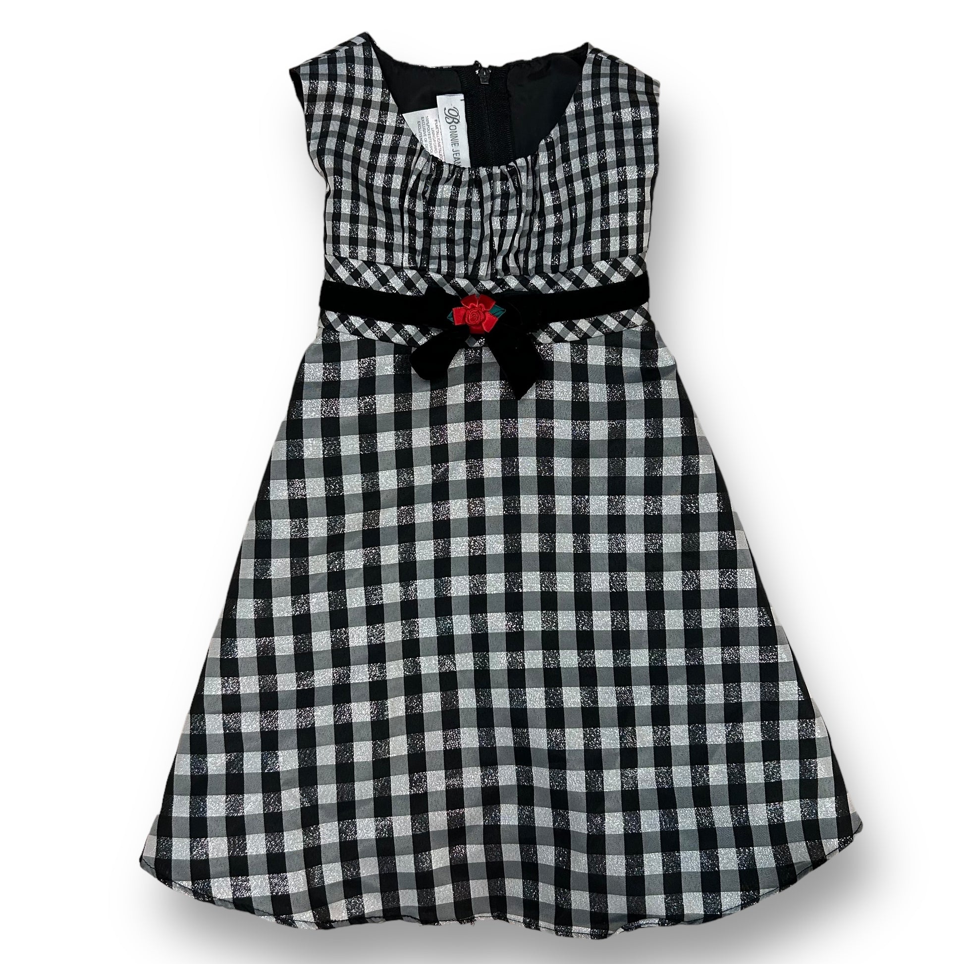 Girls' Bonnie Jean checkered holiday dress in black and white with a shimmering pattern and a red belt buckle.