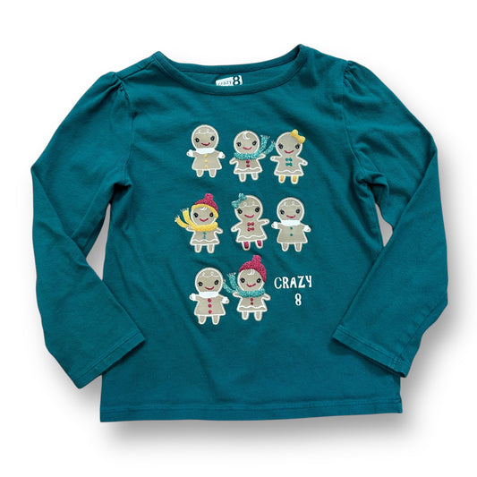 Green long sleeve Christmas themed shirt with gingerbread characters and the text 'CRAZY 8'.