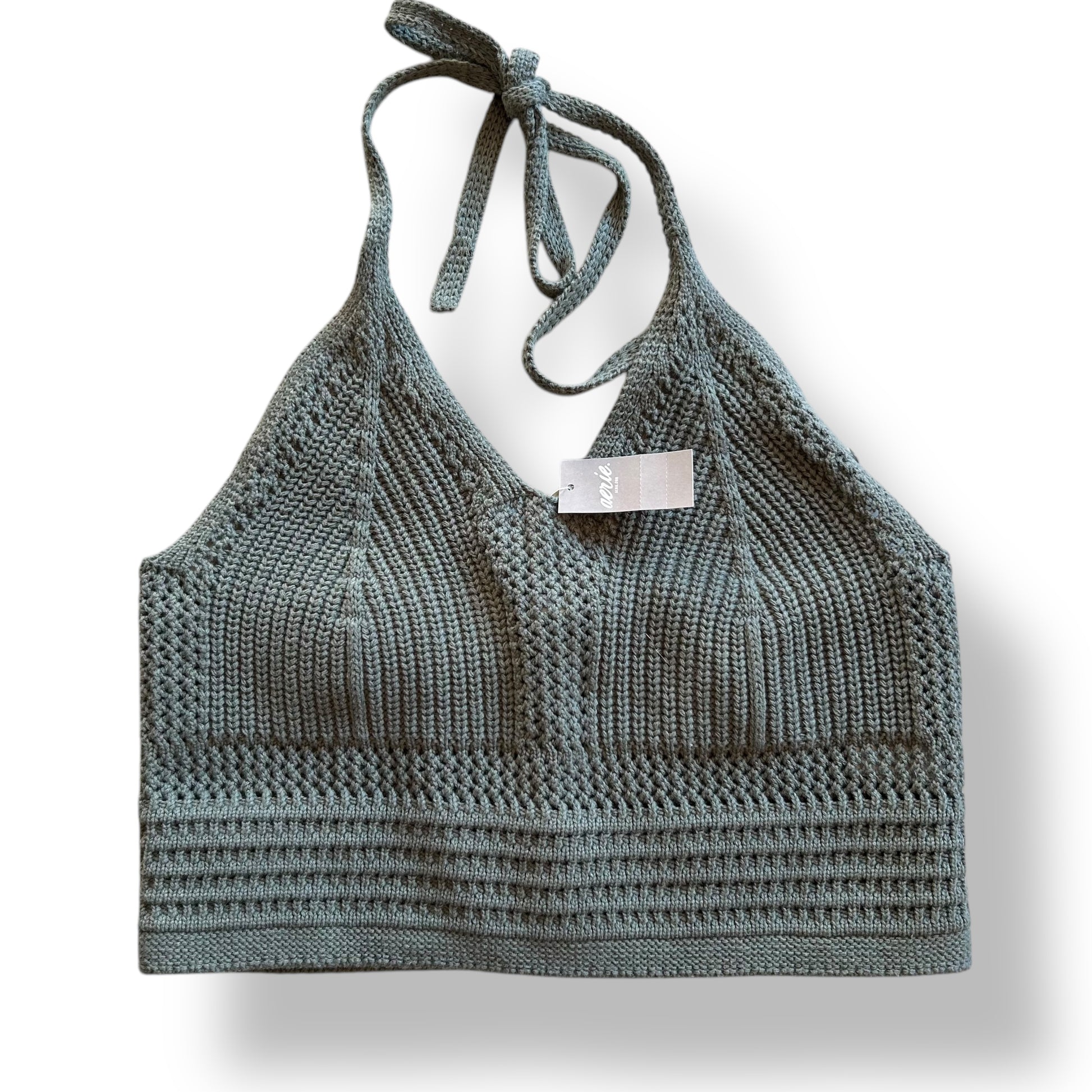 A dark green knit crochet crop top by Aerie, featuring a halter neckline and short straps.