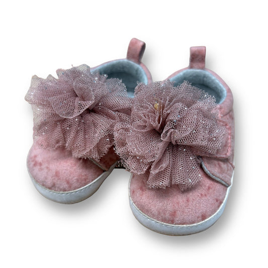 A pair of pink blush fancy tulle slip-on sneakers for girls size 0-6 months.