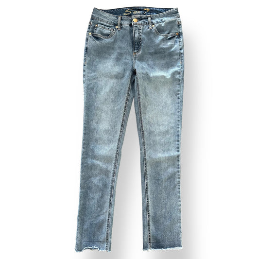 Pair of Seven7 Jeans light blue pants on a white background