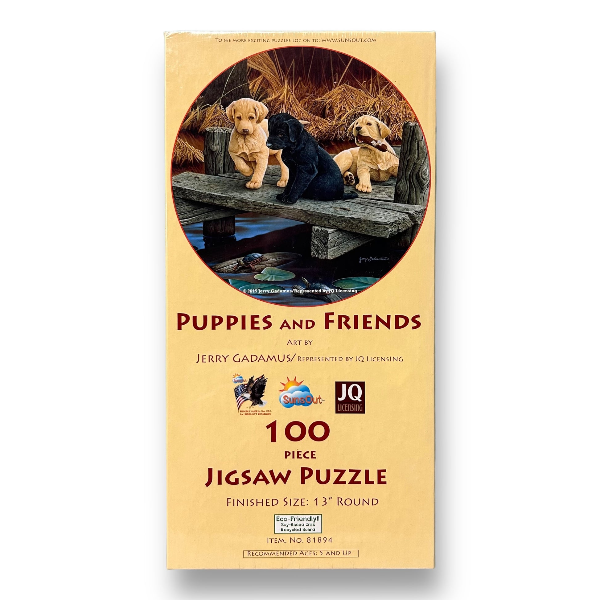 A 100-piece jigsaw puzzle depicting a group of puppies and adult dogs on a wooden structure with grass and trees in the background.