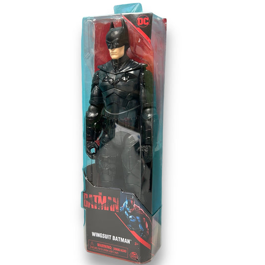 A 12-inch action figure of Batman in a wingsuit, packaged in a window display box.
