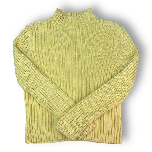 A yellow mock turtleneck sweater by Valerie Stevens, displayed on a mannequin against a white background.