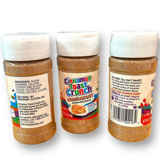 Three jars of Cinnamon Toast Crunch cereal in a row on a white background